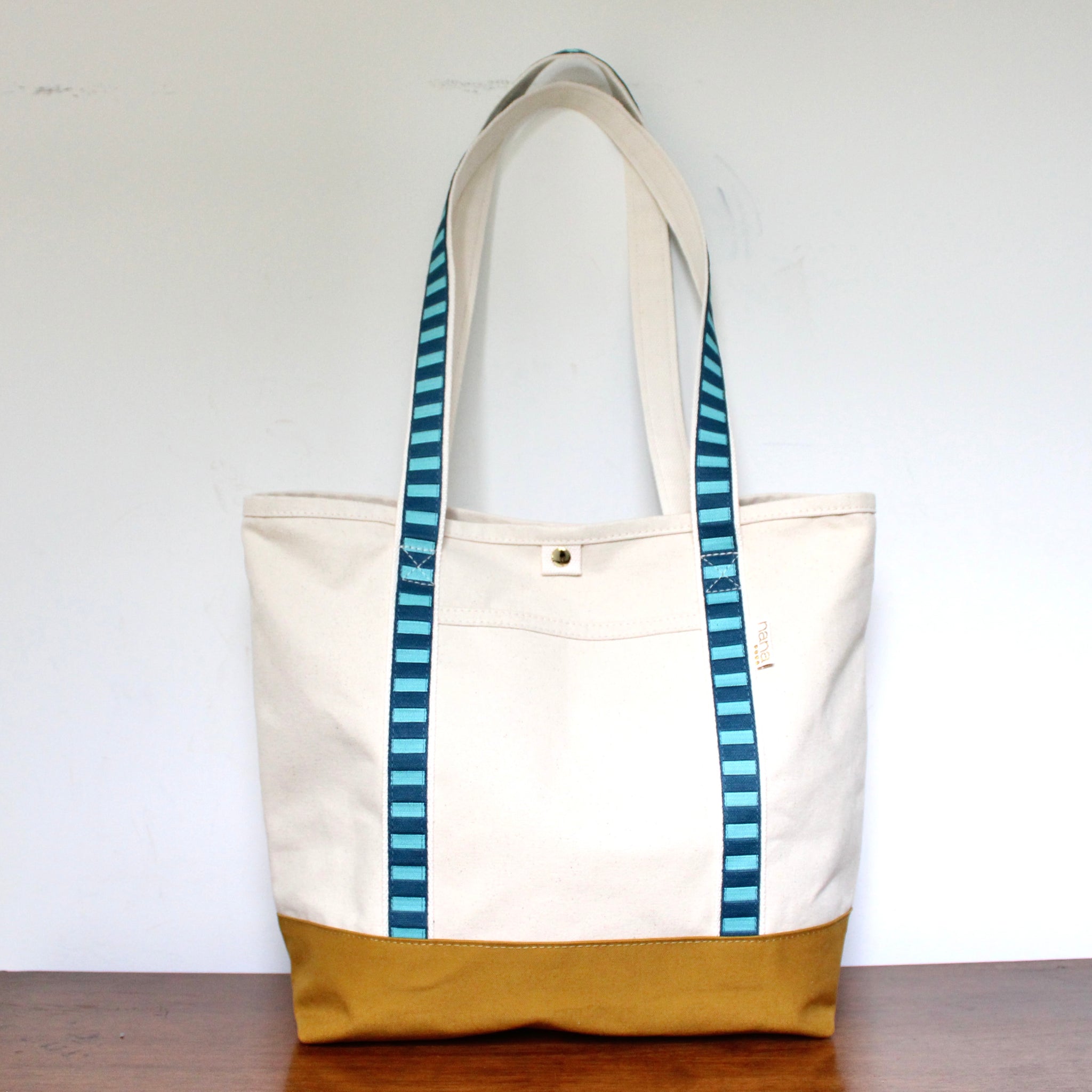 canvas travel tote: peacock + turquoise strap