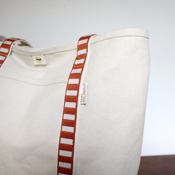 canvas travel tote: saddle + off white strap