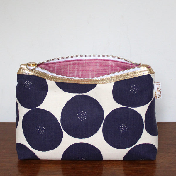 bertha clutch: jumbo navy dots