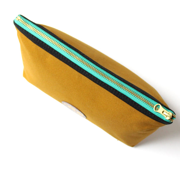 canvas dopp bag: ochre + black