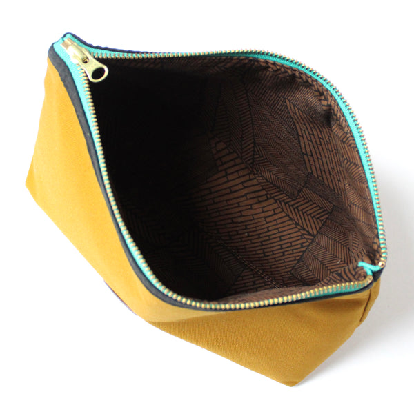 canvas dopp bag: ochre + black