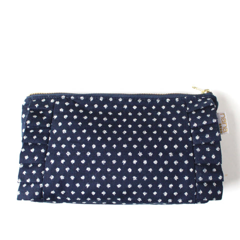 ruffle clutch: navy with white dots