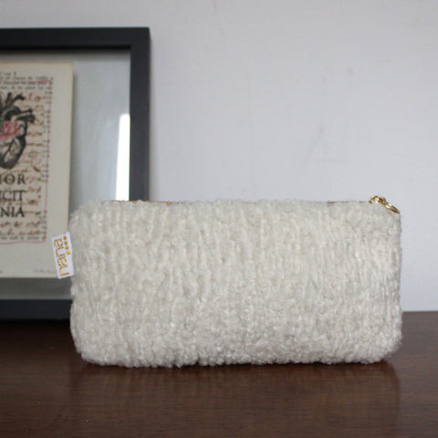 warm fuzzy clutch: snow white