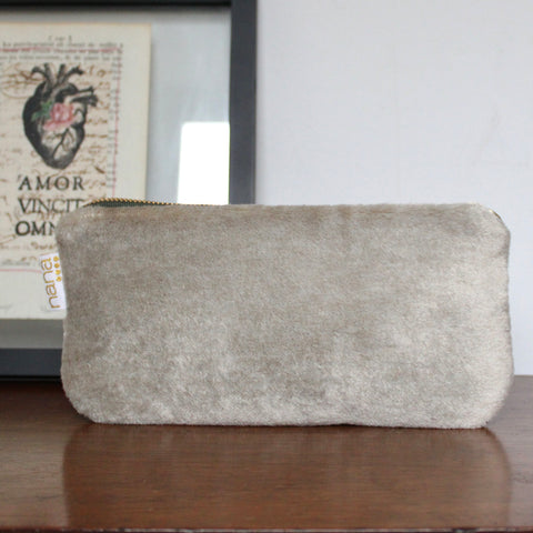 warm fuzzy clutch: taupe