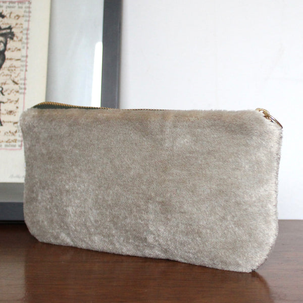 warm fuzzy clutch: taupe