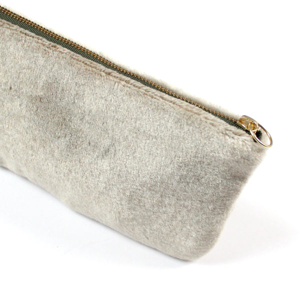 warm fuzzy clutch: taupe